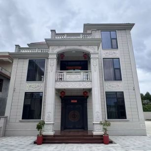 儋州 芝麻白石材别墅干挂案例展示